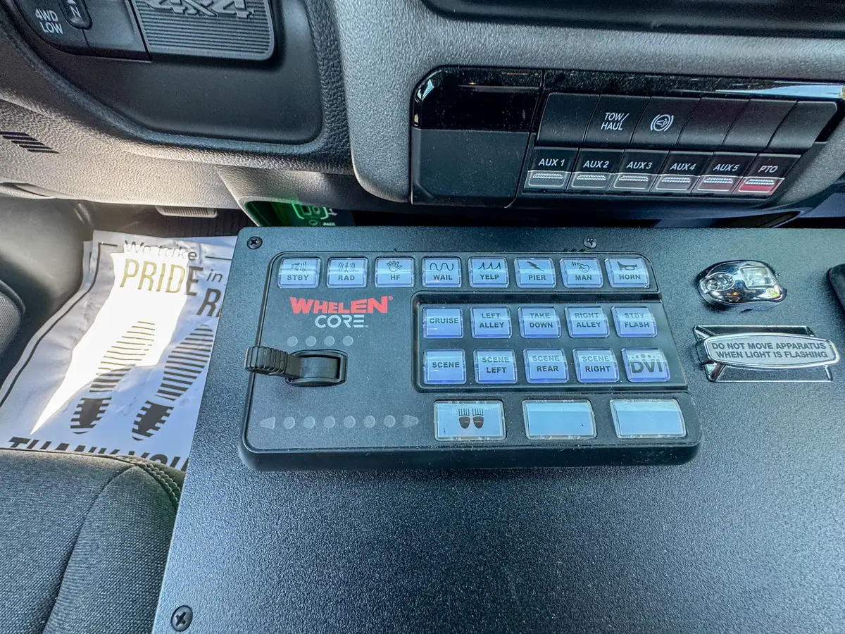 Rear bench-seat interior view with seat cushions and legroom area.
